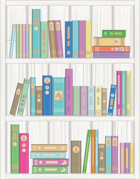 Library Books in book case made of white timber
