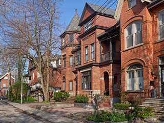 Fototapeta na wymiar street with Victorian style brick houses