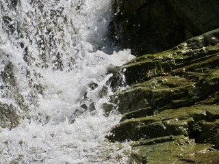 Rushing Water Against Rock