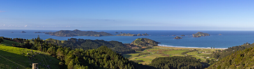 Panorama of Matauri Bay and Cavalli Islands, Northland, New Zealand on Bright Sunny Afternoon from Roadside Lookout Point