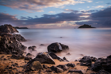 Fototapeta na wymiar Long Exposure of Sunrise at Te Ngaere Bay, Northland, New Zealand, Selective Focus