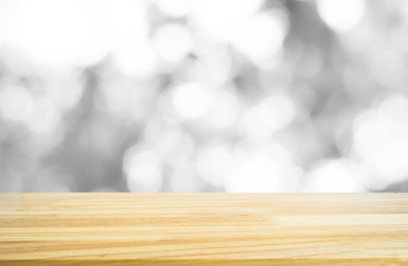 Wood table top on white grey bokeh blurred in background