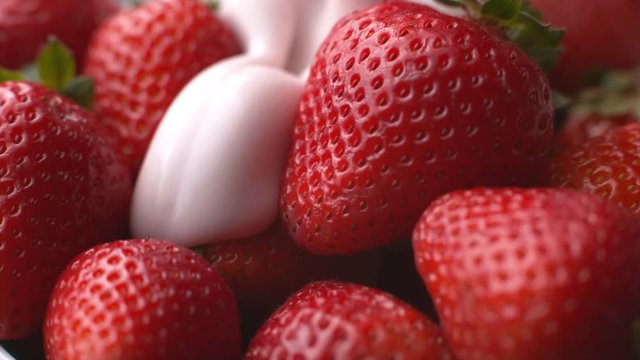 Pouring yogurt onto strawberries in super slow motion, shot on Phantom Flex 