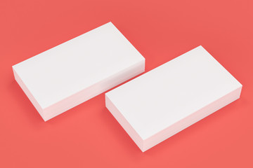 White blank business cards mock-up on red background