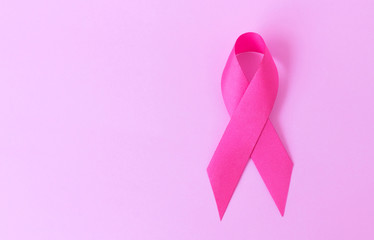 Pink ribbon on pink background, Awareness breast cancer concept