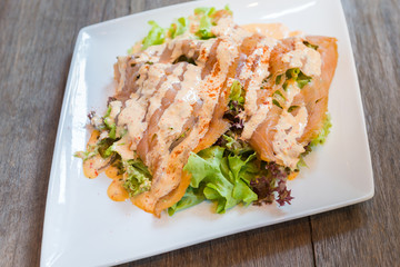 Fish salad - slice salmon and vegetables