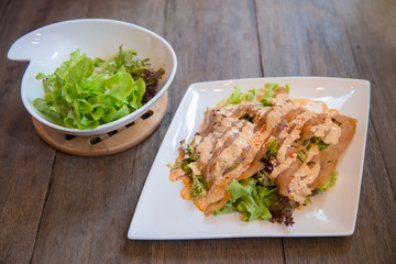 Fish salad - slice salmon and vegetables