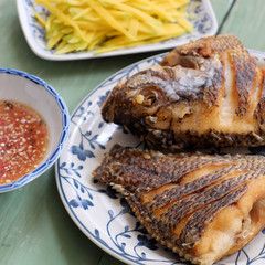 Vietnamese food, fried fish with mango