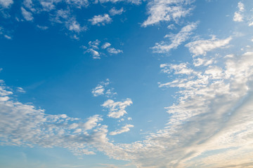 Naklejka na ściany i meble Cloudscape of dawn on blue sky
