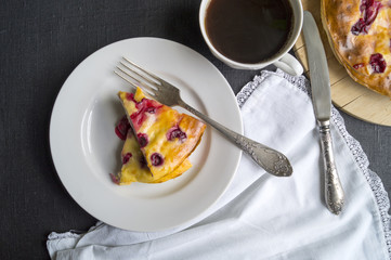 Cheesecake with berries, cherries. on a white plate