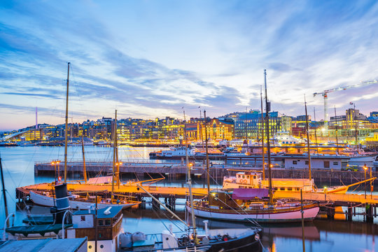 Oslo city, Oslo port with boats and yachts at twilight in Norway