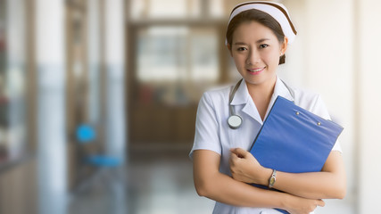 Close up of Asian nurse in blurred background