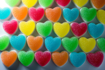 Heart candies coated with sugar, heart colorful sweet candies, sugar heart shaped candy