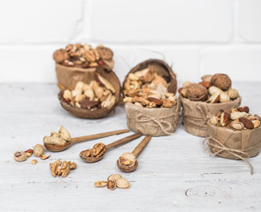 different nuts in plates