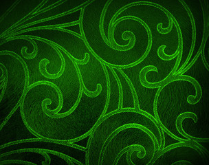 floral background in green tones.