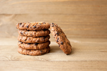Cookies on rustic wooden  table. Chocolate dessert.