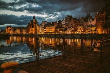 The old town in Gdansk at the evening as seen from harbor