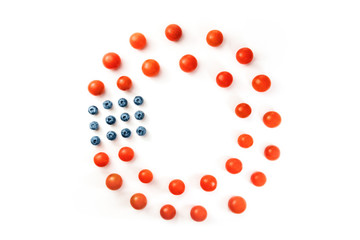 Culinary still life in colors of American flag, on white