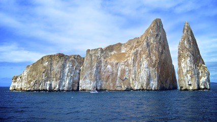 Kicker Rock (Leon Dormido), a striking volcanic rock formation off San Cristobal in the Galapagos...