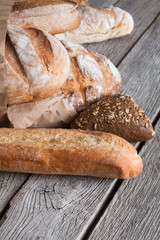 Bread background with copy space on rustic wood