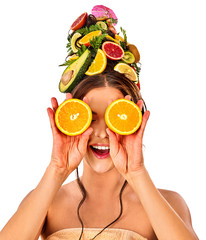 Hair mask from fresh fruits on woman head. Girl with beautiful face and hairstyle hold halves of orange closed eyes for organic skin and body therapy. Concept of healthy and beauty on isolated. - obrazy, fototapety, plakaty