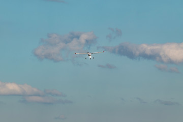 Unmanned aerial vehicle (UAV) in blue sky.
