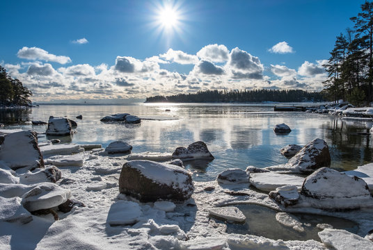 Scenic Landscape With Bright Sun And Sea At Winter Time In Finland