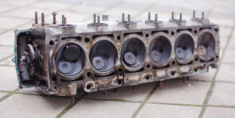 Obraz na płótnie Canvas Close-up the head of a six-cylinder engine