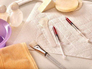 Cosmetic tools, drugs and syringes for beauty injections. Still life of items for medical cosmetology. Using natural and chemical methods and components to create, restore and maintain female beauty.