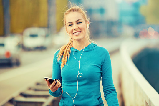 Blonde woman is jogging