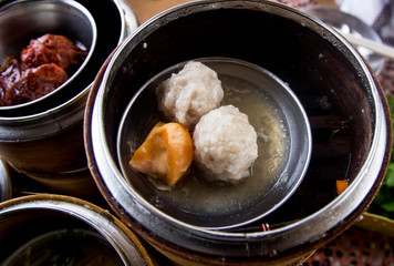 Dim sum in bamboo steamer- Chinese cuisine