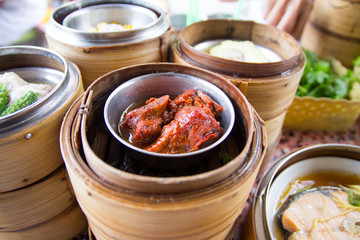 Dim sum in bamboo steamer- Chinese cuisine