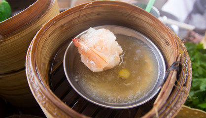 Dim sum in bamboo steamer- Chinese cuisine