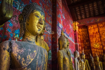 Bhudda statues in a temple in Luang Pranbang, Laos