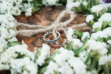 Wedding day. The groom places the ring on the bride's hand. Photo closeup
