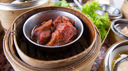 Dim sum in bamboo steamer- Chinese cuisine