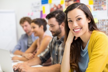 Portrait of executive sitting in conference room 