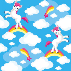 Fairy children seamless pattern with the image of cute unicorns. Colorful vector background