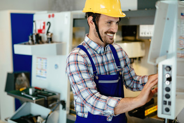 industrial factory employee working in metal manufacturing industry