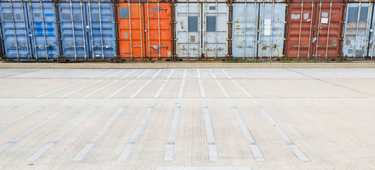 The containers on the road.