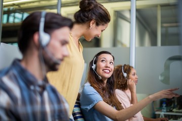 Female customer executive talking with people