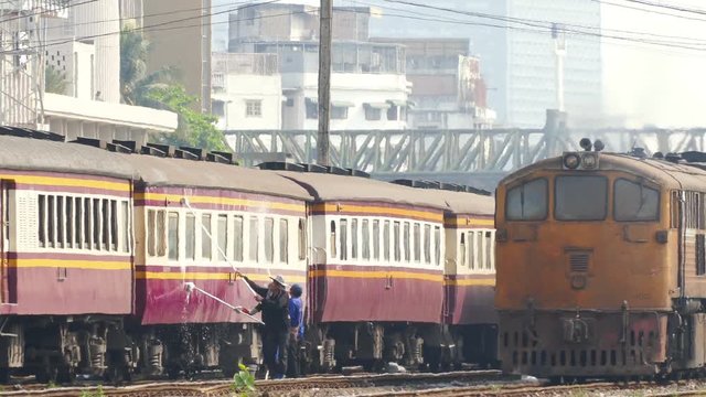 Cleaning of train cars at Hua Lamphong railway station in Bangkok, Thailand. Hua Lamphong railway station is one of the largest transport hubs in Asia.