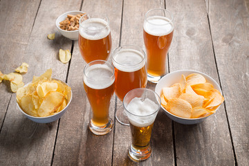 glass beer on wood background