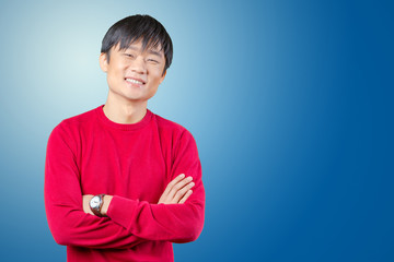 Handsome young asian man smiling