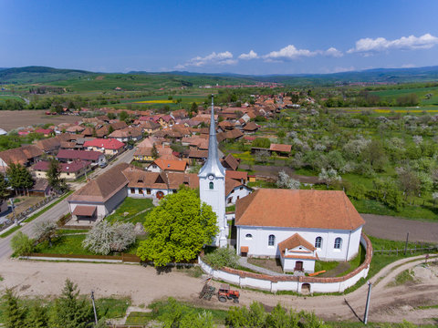 Talisoara Olasztelek  village Church in Covasna County, Transylvania, Romania aerial view