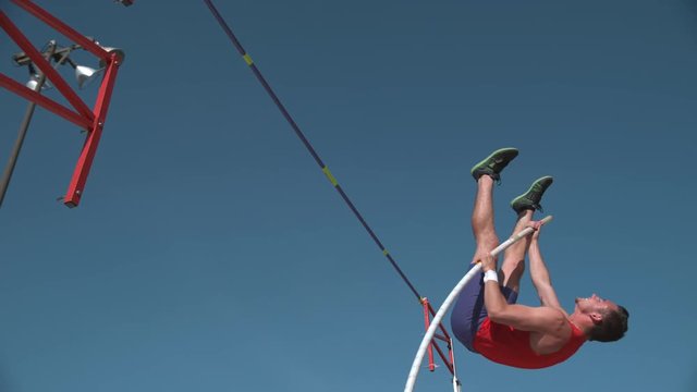 Track athlete doing pole vault in super slow motion, shot on Phantom Flex 