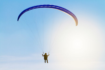 Parachute against blue sky