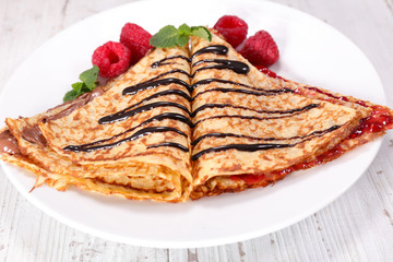 crepe with chocolate and raspberry