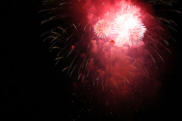 Bright lights of the salute against the black sky