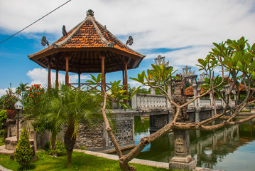 Water Palace Udjung. The bridge over the pond. Bali, Indonesia